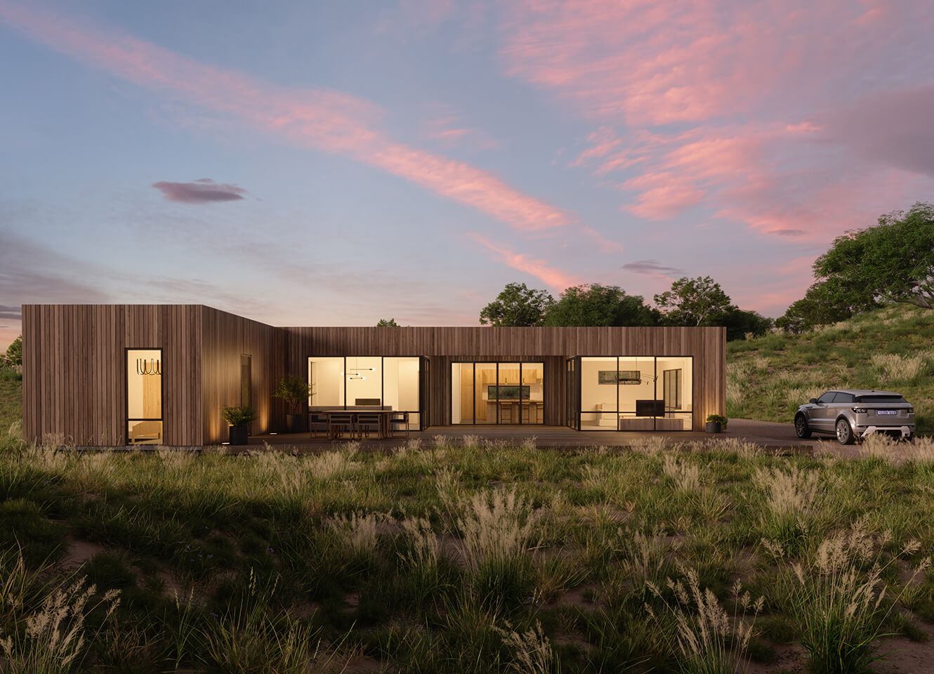 front view of pique's hillside harmorny 4 bedroom modular home during sunset