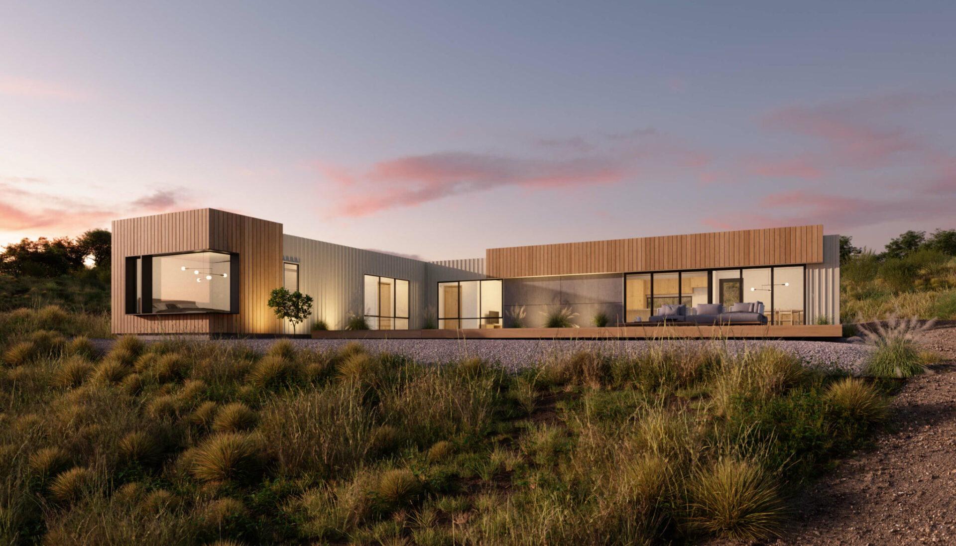 wide shot of pique's free to roam 3 bedroom prefabricated homes at dusk