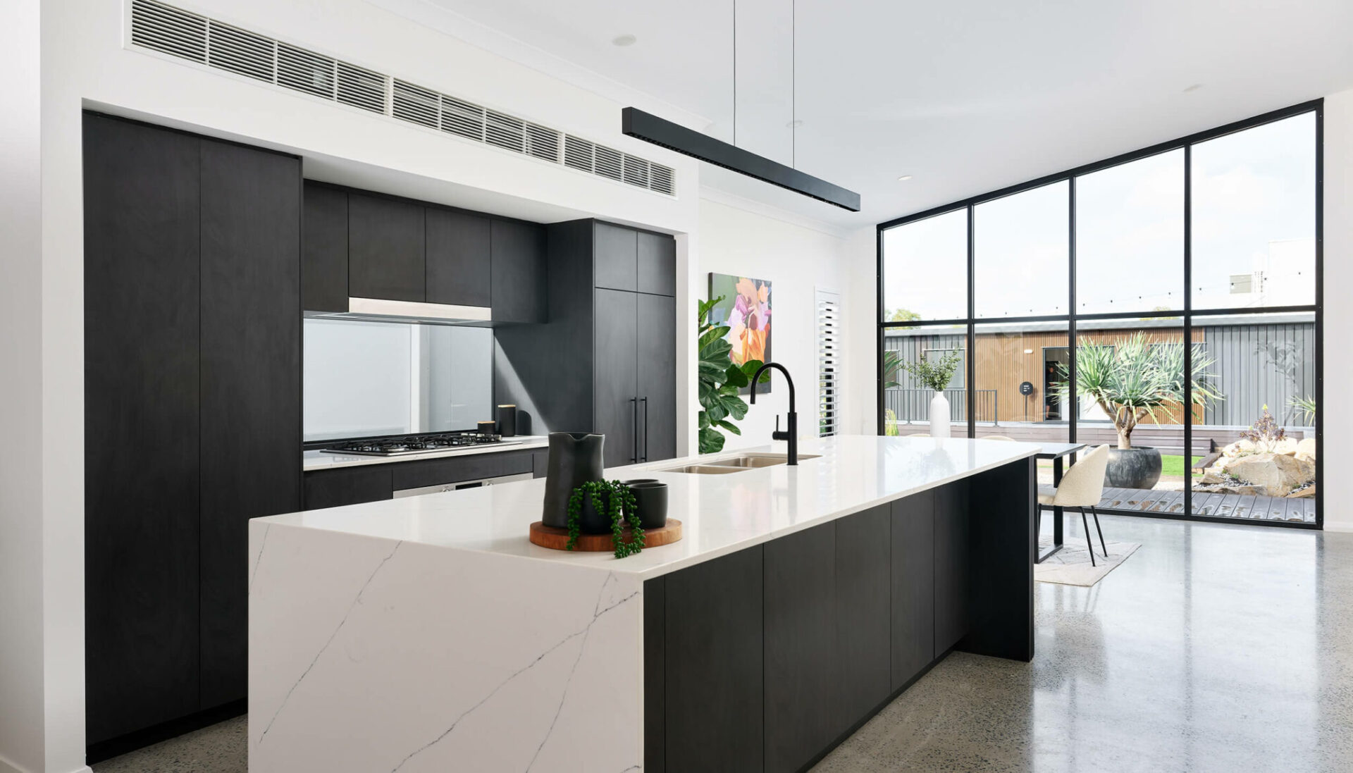 Kitchen area inside the 3 bedroom modular home Wildwood design by PIQUE