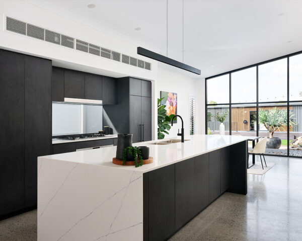 Kitchen area inside the 3 bedroom modular home Wildwood design by PIQUE